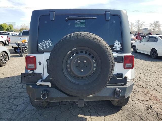 Photo 6 from auction – 2016 JEEP WRANGLER U with VIN 1C4HJWDG0GL339862