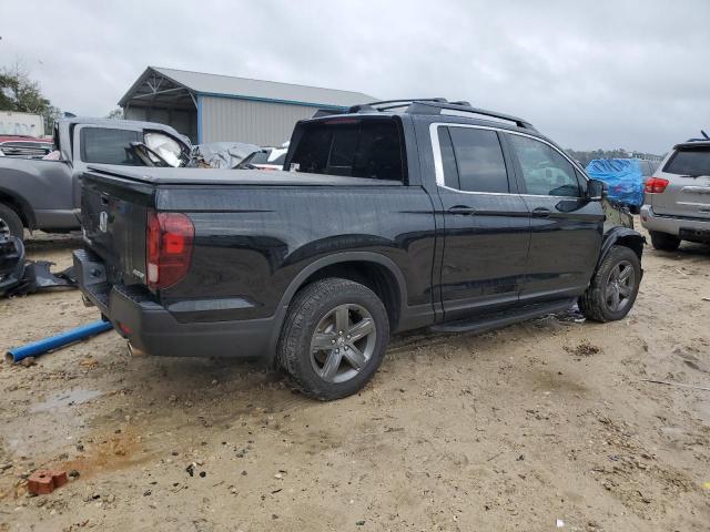 Photo 3 from auction – 2023 HONDA RIDGELINE with VIN 5FPYK3F59PB057849