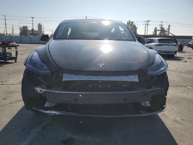 Photo 5 from auction – 2022 TESLA MODEL Y with VIN 7SAYGDEF6NF551080