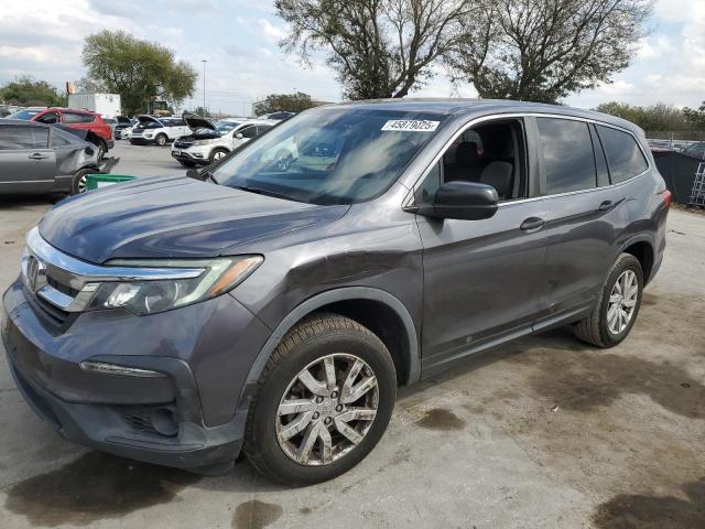 HONDA PILOT LX 2019 with VIN 5FNYF5H14KB035513 - Photo from auction