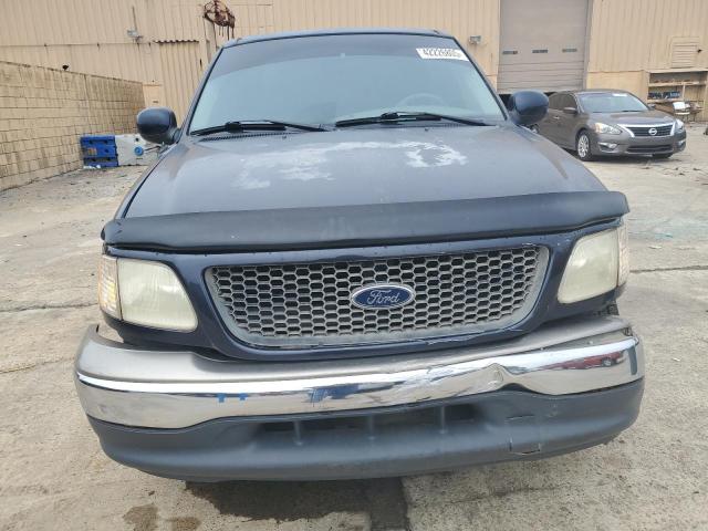 Photo 5 from auction – 2001 FORD F-150 with VIN 1FTRW07L61KB38458