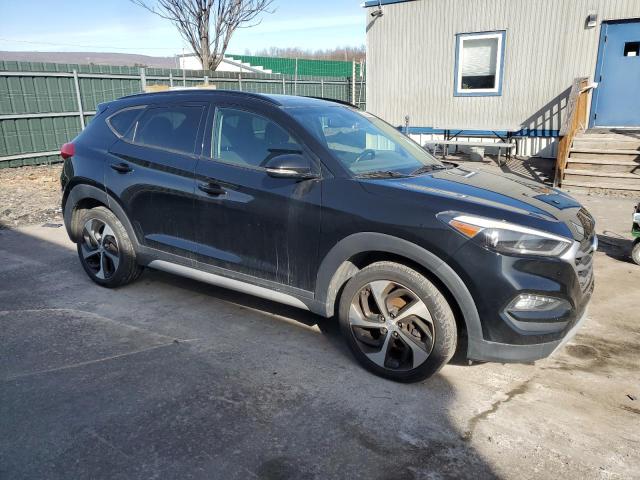 Photo 4 from auction – 2018 HYUNDAI TUCSON VAL with VIN KM8J3CA29JU636919