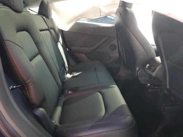 Photo 11 from auction – 2022 TESLA MODEL Y with VIN 7SAYGDEE9NF376119