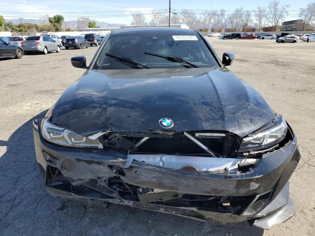 Снимка 5 от търг – 2023 BMW 330I с VIN 3MW69FF02P8D57123