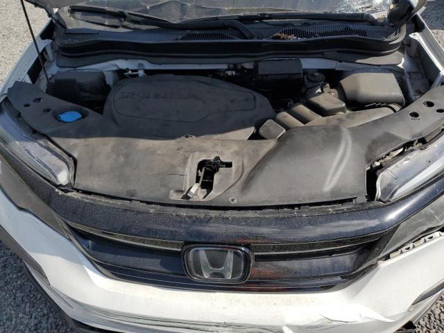 Photo 12 from auction – 2021 HONDA PILOT SE with VIN 5FNYF5H23MB033795