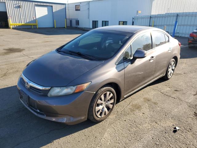HONDA CIVIC LX 2012 with VIN 19XFB2F5XCE354977 - Photo from auction