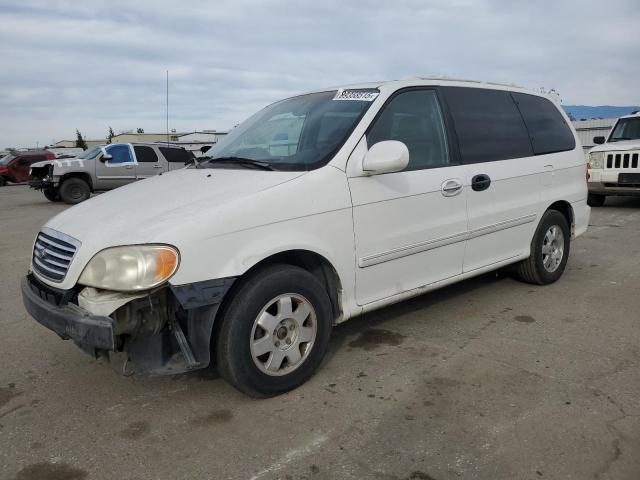 KIA SEDONA EX 2002 with VIN KNDUP131326271237 - Photo from auction