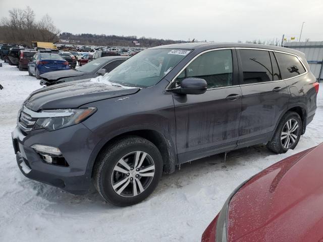 HONDA PILOT EXL 2017 with VIN 5FNYF6H54HB083272 - Photo from auction
