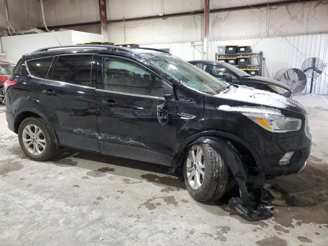 Photo 4 from auction – 2018 FORD ESCAPE SE with VIN 1FMCU0GD3JUC07630