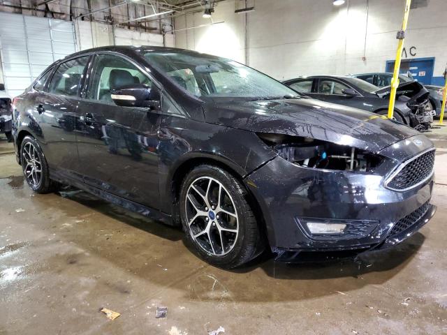 Photo 4 from auction – 2016 FORD FOCUS SE with VIN 1FADP3F21GL262339
