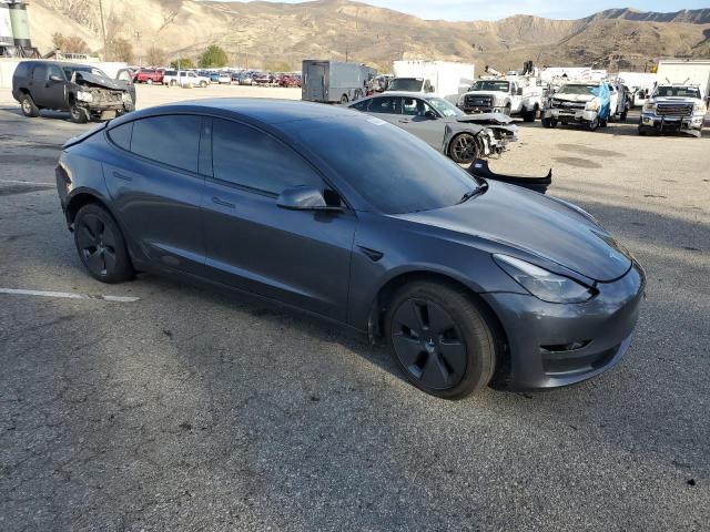 Снимка 4 от търг – 2023 TESLA MODEL 3 с VIN 5YJ3E1EA9PF620508
