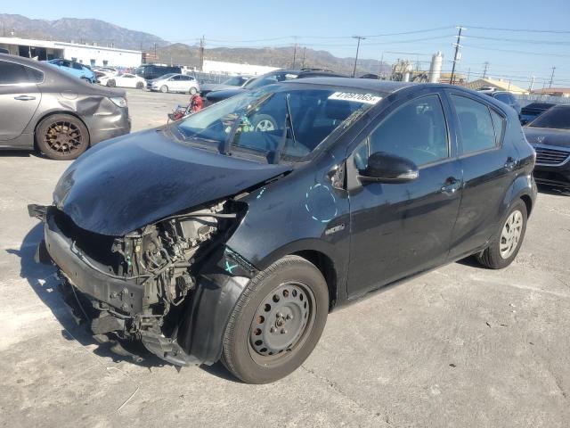 TOYOTA PRIUS C 2015 with VIN JTDKDTB35F1580208 - Photo from auction