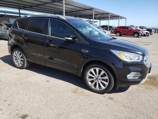 Photo 4 from auction – 2017 FORD ESCAPE TIT with VIN 1FMCU0J94HUC96123