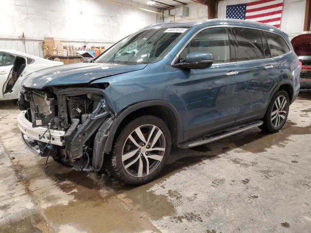 HONDA PILOT TOUR 2017 with VIN 5FNYF6H98HB083181 - Photo from auction