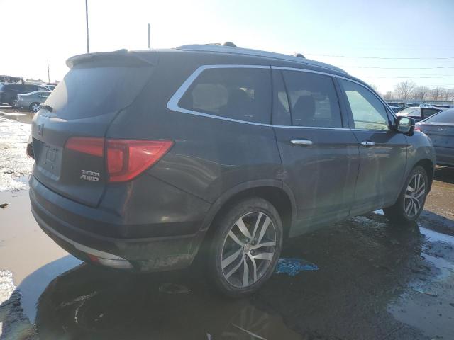 Photo 3 from auction – 2016 HONDA PILOT TOUR with VIN 5FNYF6H93GB049678