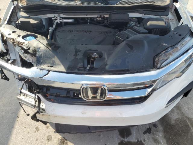 Photo 12 from auction – 2021 HONDA PILOT ELIT with VIN 5FNYF6H00MB064376