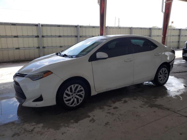 TOYOTA COROLLA L 2019 with VIN 5YFBURHE8KP942582 - Photo from auction