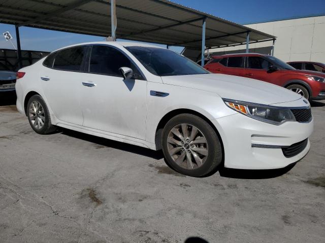 Photo 4 from auction – 2018 KIA OPTIMA LX with VIN 5XXGT4L33JG265224