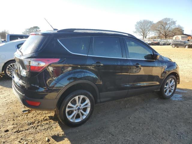 Photo 3 from auction – 2017 FORD ESCAPE SE with VIN 1FMCU0GD5HUE64492