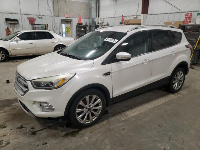 Photo 1 from auction – 2017 FORD ESCAPE TIT with VIN 1FMCU9J9XHUA77459