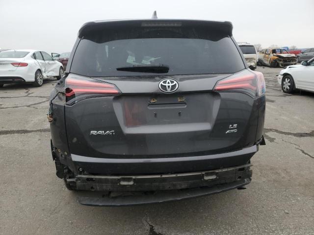 Photo 6 from auction – 2018 TOYOTA RAV4 LE with VIN JTMBFREV2JJ184868