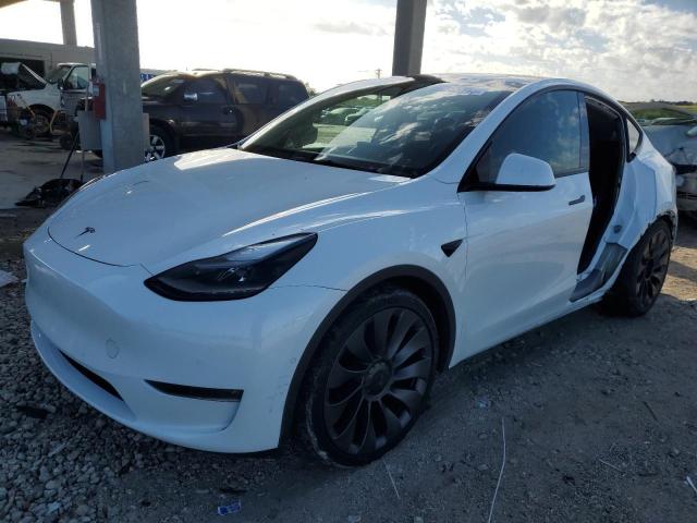 TESLA MODEL Y 2022 with VIN 7SAYGDEF9NF319525 - Photo from auction