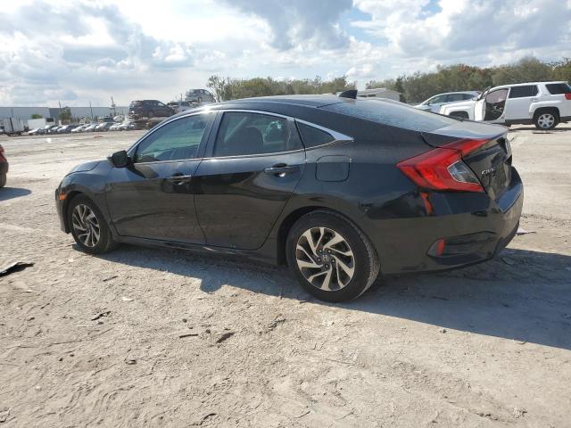 Photo 2 from auction – 2018 HONDA CIVIC EX with VIN 19XFC2F70JE016693