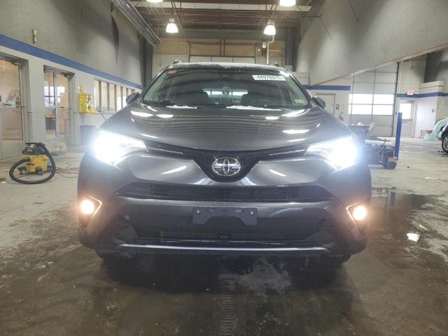 Photo 5 from auction – 2018 TOYOTA RAV4 LIMIT with VIN JTMDFREV8JJ223259