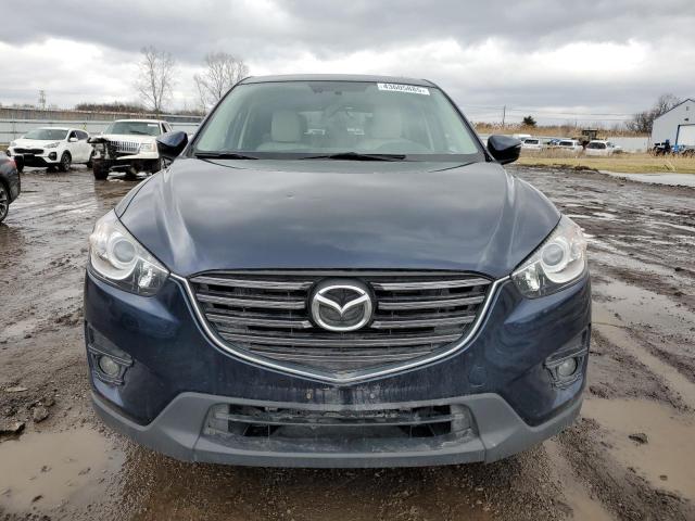 Photo 5 from auction – 2016 MAZDA CX-5 GT with VIN JM3KE4DYXG0858773