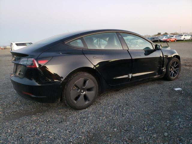 Снимка 3 от търг – 2022 TESLA MODEL 3 с VIN 5YJ3E1EB0NF272653