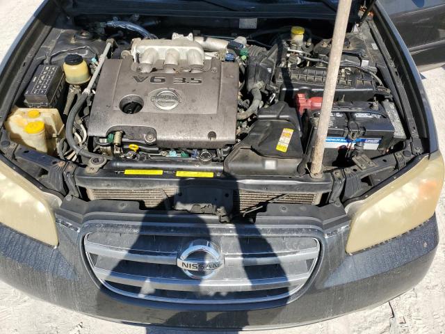 Photo 11 from auction – 2002 NISSAN MAXIMA GLE with VIN JN1DA31D92T418675