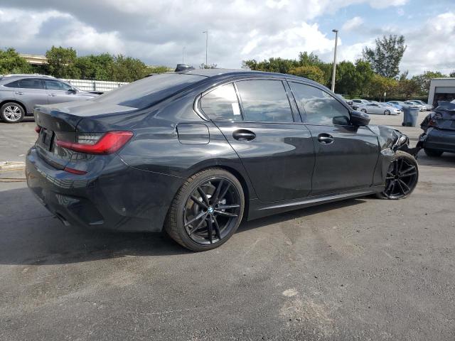 Photo 3 from auction – 2021 BMW 330I with VIN 3MW5R1J07M8B95975