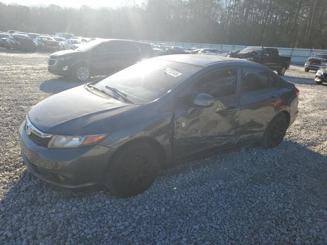HONDA CIVIC LX 2012 with VIN 2HGFB2F54CH320264 - Photo from auction
