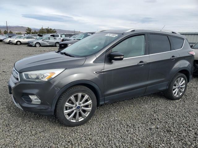 FORD ESCAPE TIT 2017 with VIN 1FMCU9J95HUB03952 - Photo from auction