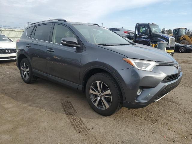 Photo 4 from auction – 2016 TOYOTA RAV4 XLE with VIN JTMRFREV5GD186667