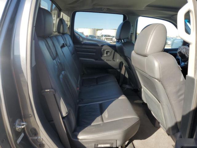 Photo 10 from auction – 2010 HONDA RIDGELINE with VIN 5FPYK1F54AB011261