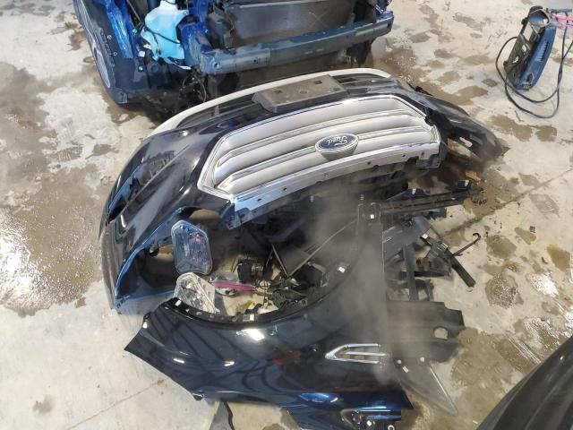 Photo 12 from auction – 2017 FORD ESCAPE TIT with VIN 1FMCU9J99HUE48515
