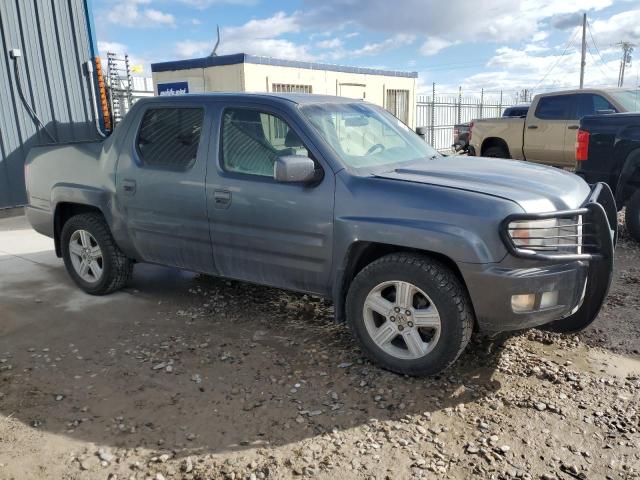 Photo 4 from auction – 2010 HONDA RIDGELINE with VIN 5FPYK1F58AB006922