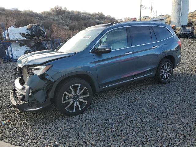 HONDA PILOT TOUR 2022 with VIN 5FNYF6H64NB011184 - Photo from auction