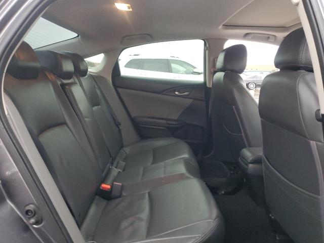 Photo 10 from auction – 2018 HONDA CIVIC EX with VIN 19XFC2F74JE014591