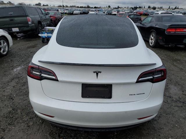Снимка 6 от търг – 2021 TESLA MODEL 3 с VIN 5YJ3E1EB5MF071510