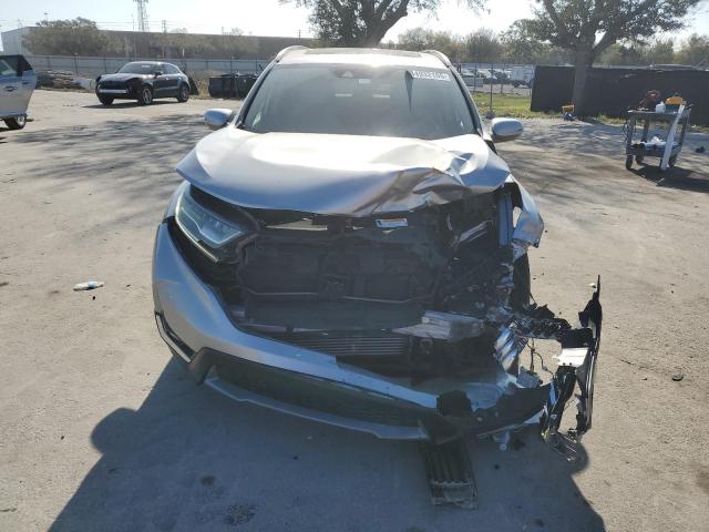 Photo 5 from auction – 2017 HONDA CR-V with VIN 5J6RW1H99HL009850