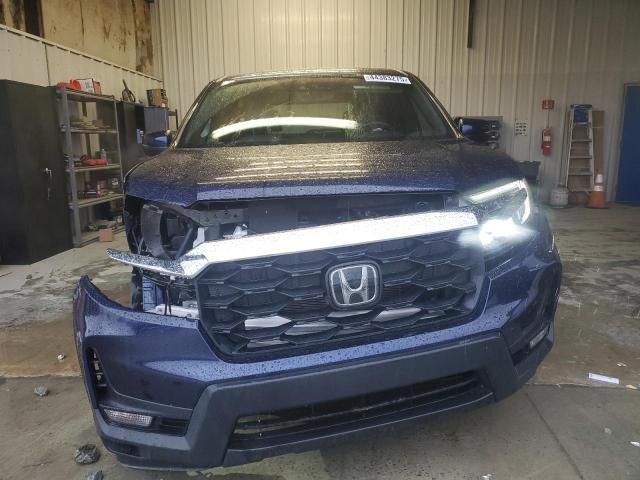 Photo 5 from auction – 2023 HONDA PASSPORT E with VIN 5FNYF8H52PB017894