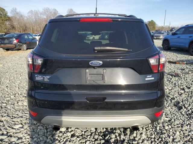Photo 6 from auction – 2018 FORD ESCAPE SE with VIN 1FMCU0GD0JUB95274
