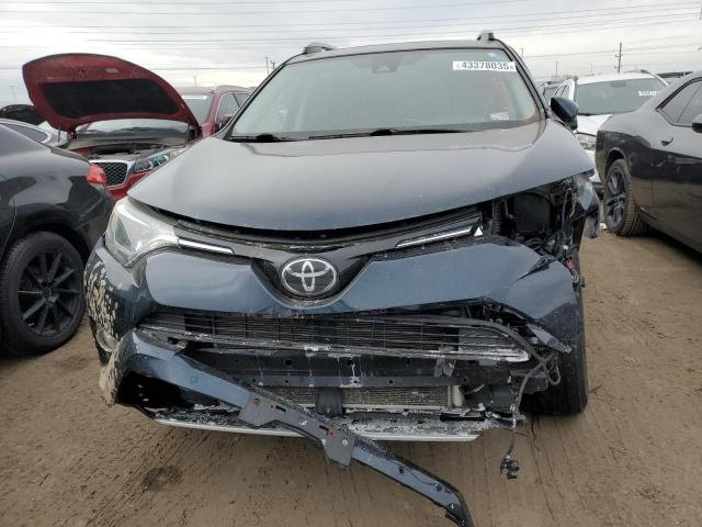 Photo 5 from auction – 2017 TOYOTA RAV4 XLE with VIN JTMRFREV4HD199332
