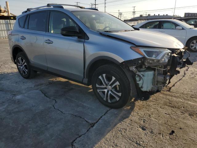 Photo 4 from auction – 2018 TOYOTA RAV4 LE with VIN JTMZFREV3JJ186031