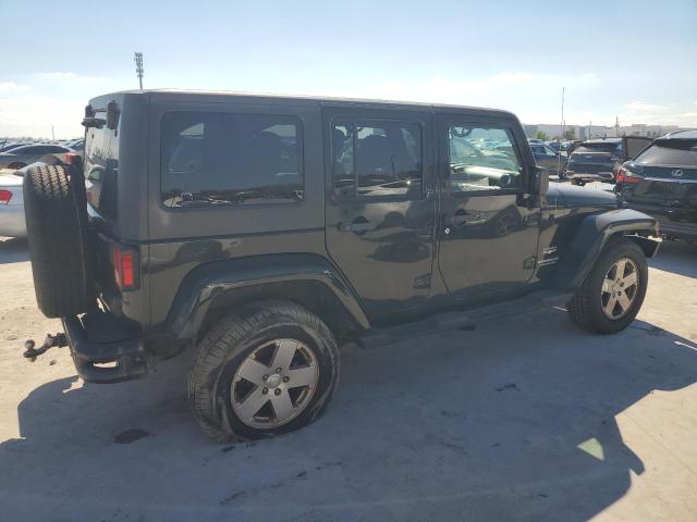 Photo 3 from auction – 2011 JEEP WRANGLER U with VIN 1J4HA5H1XBL619601