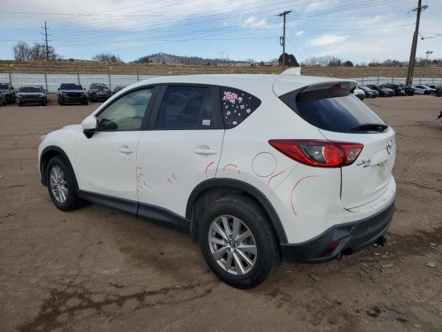 Photo 2 from auction – 2014 MAZDA CX-5 TOURI with VIN JM3KE4CY4E0405991