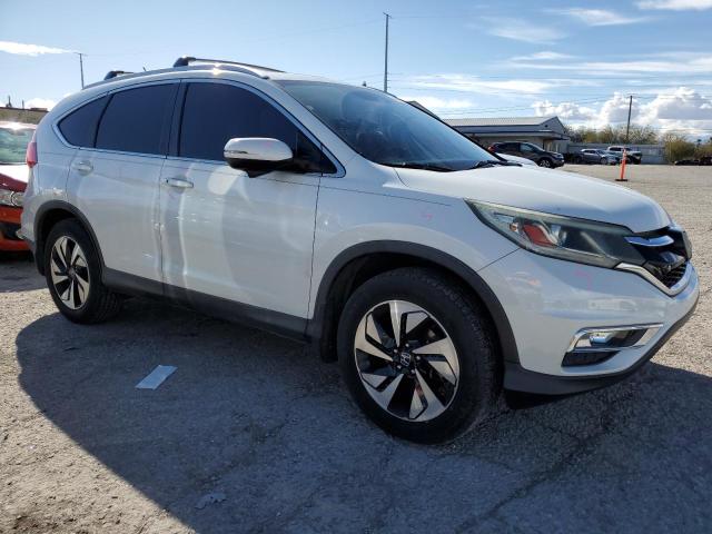 Photo 4 from auction – 2015 HONDA CR-V TOURI with VIN 5J6RM3H95FL021329