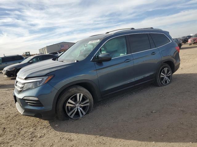 HONDA PILOT EXLN 2018 with VIN 5FNYF6H75JB045802 - Photo from auction